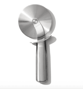 Pizza cutter for gluten-free and dairy-free pizza dough.