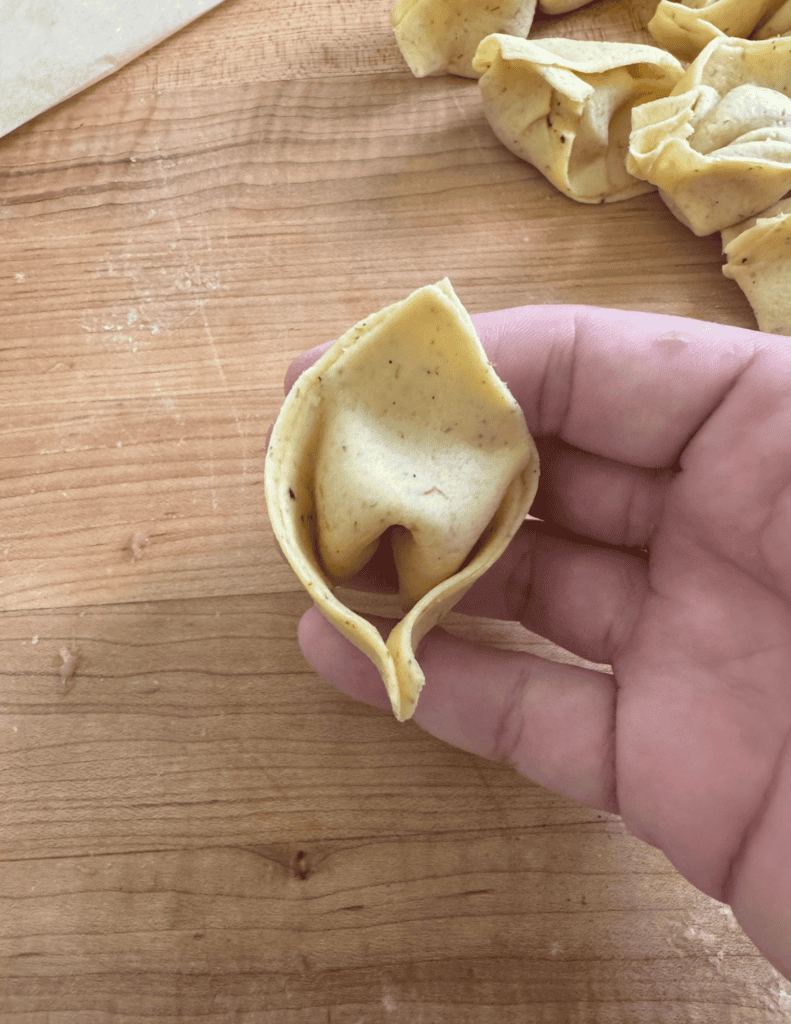 Fried Wonton Shaping showing off the final shape of the wonton.