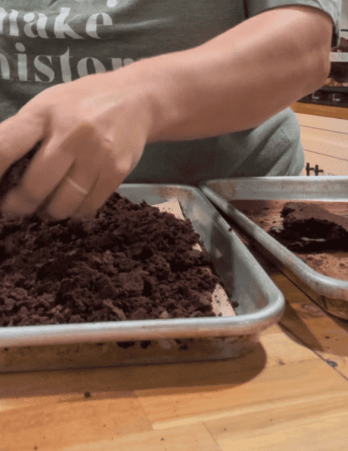 cookie crumble being broken into pieces.