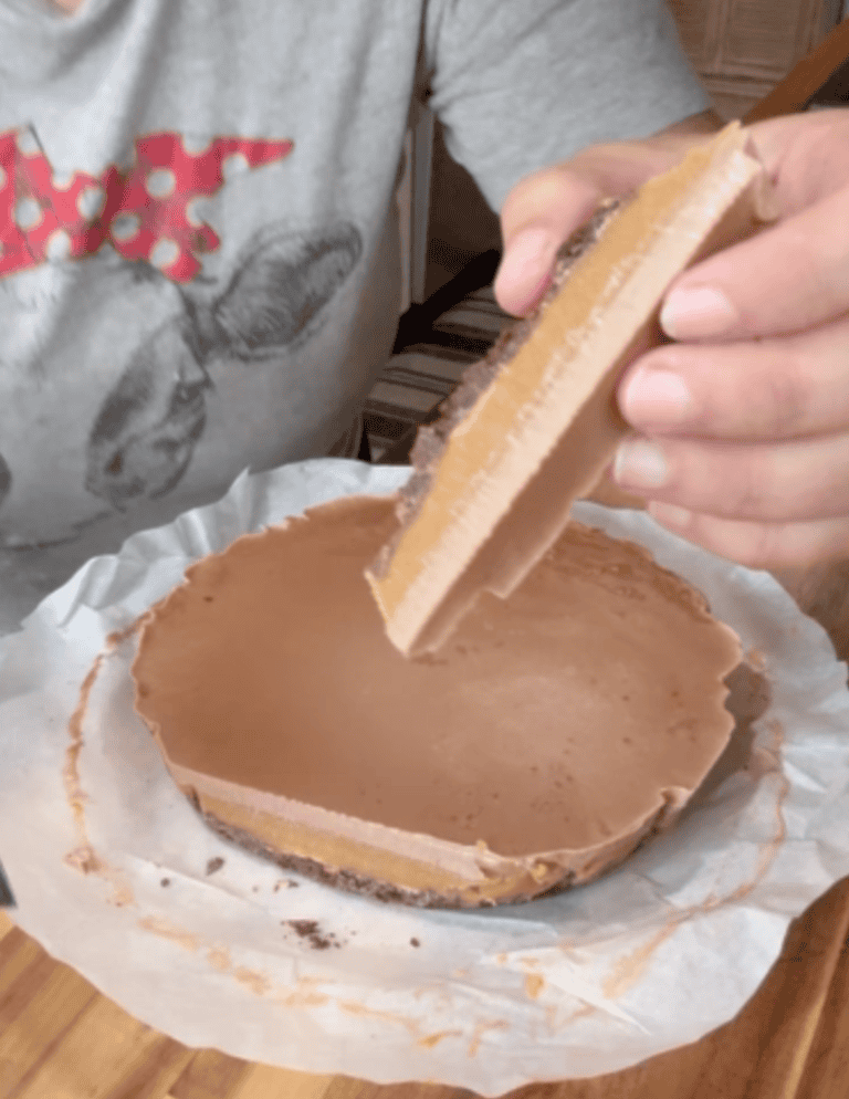 Triple layer dessert cake with all three layers showing.