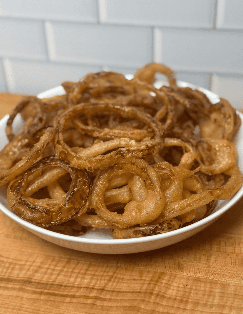 onion rings in a bowl on the counter