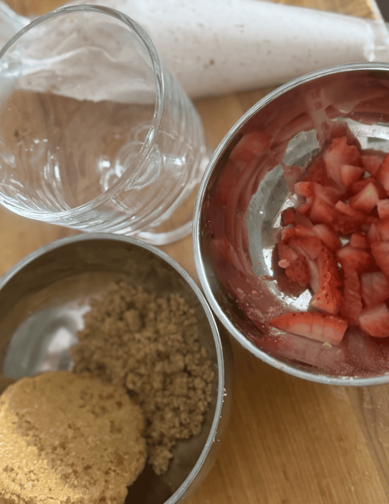 Freshly chopped strawberries for dessert topping at Farm Fresh Family.