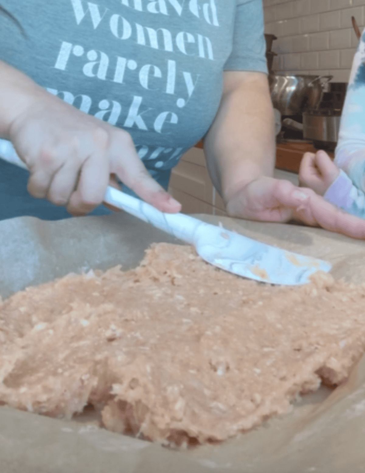 chicken caesar mix spread thin on parchment paper