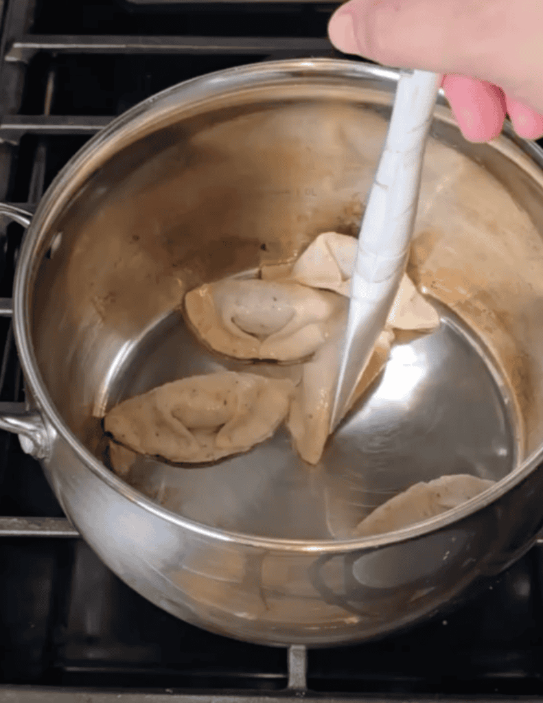 gluten free pot stickers recipe with pot stickers in the saucepan