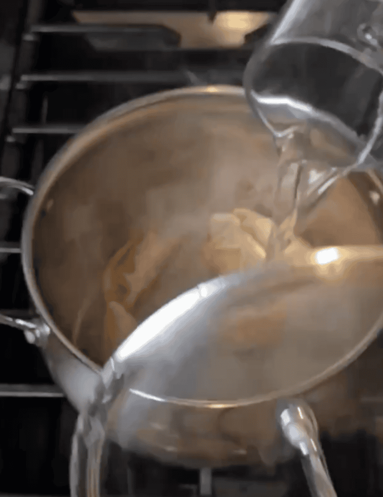 gluten free pot stickers recipe with pot stickers in the saucepan adding water
