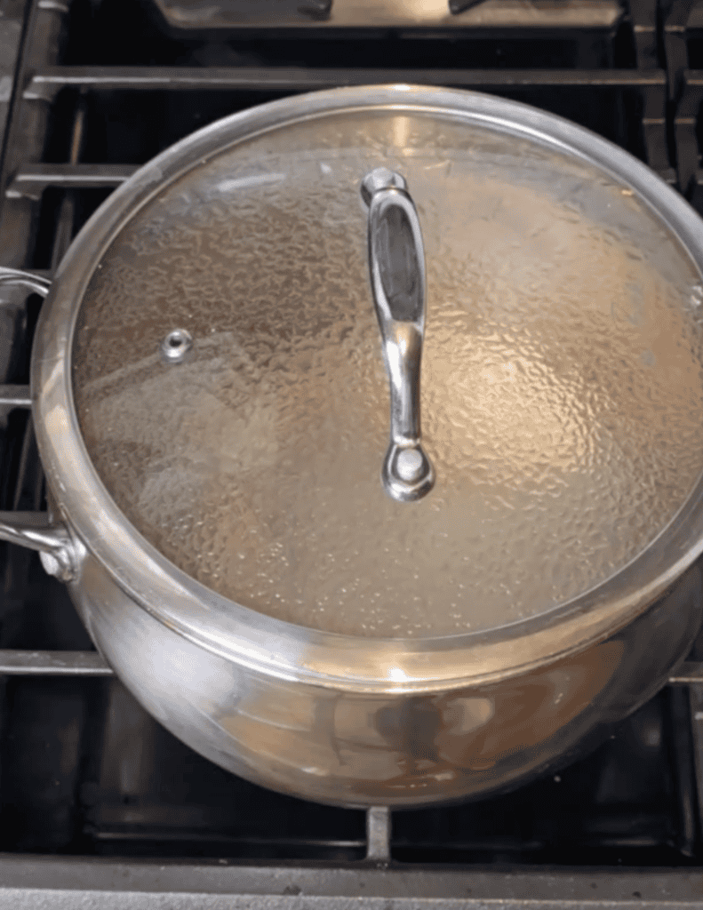 gluten free pot stickers recipe with pot stickers in the saucepan trapping steam