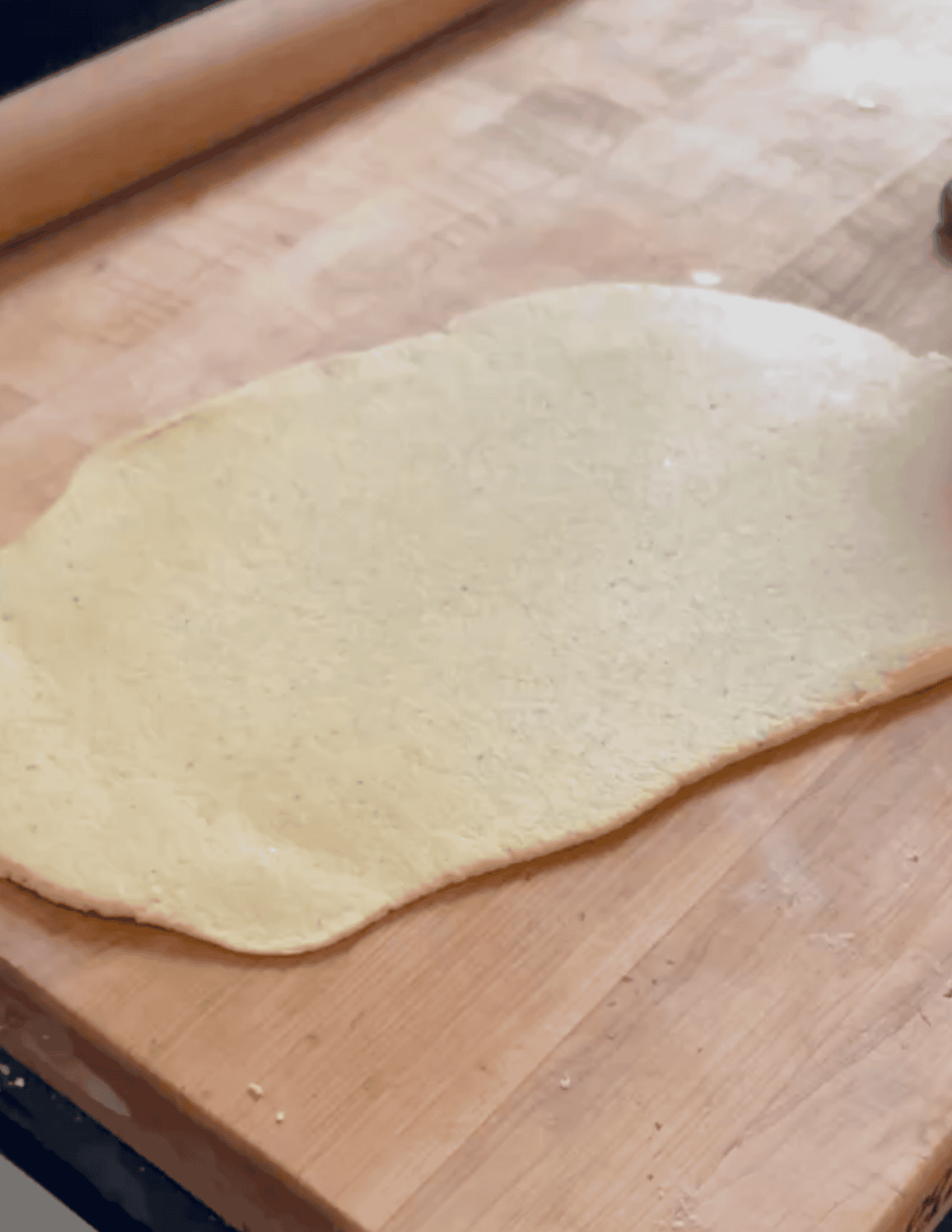 rolling out wonton dough