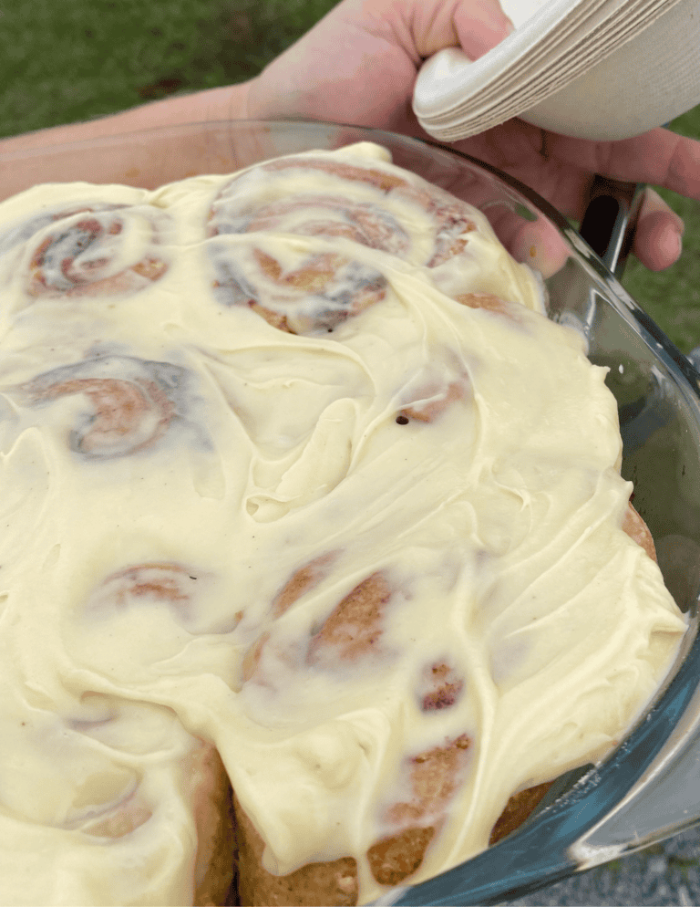 Cinnamon rolls coated in cream cheese icing