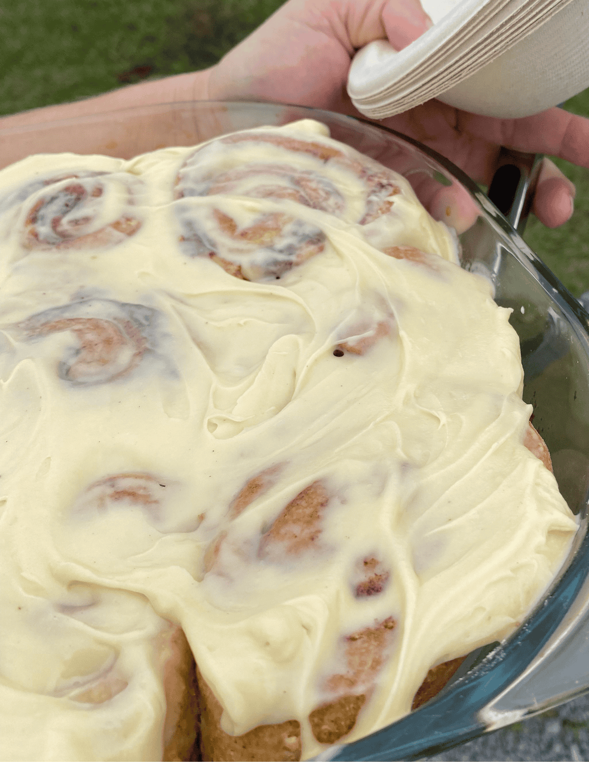Cinnamon rolls coated in cream cheese icing
