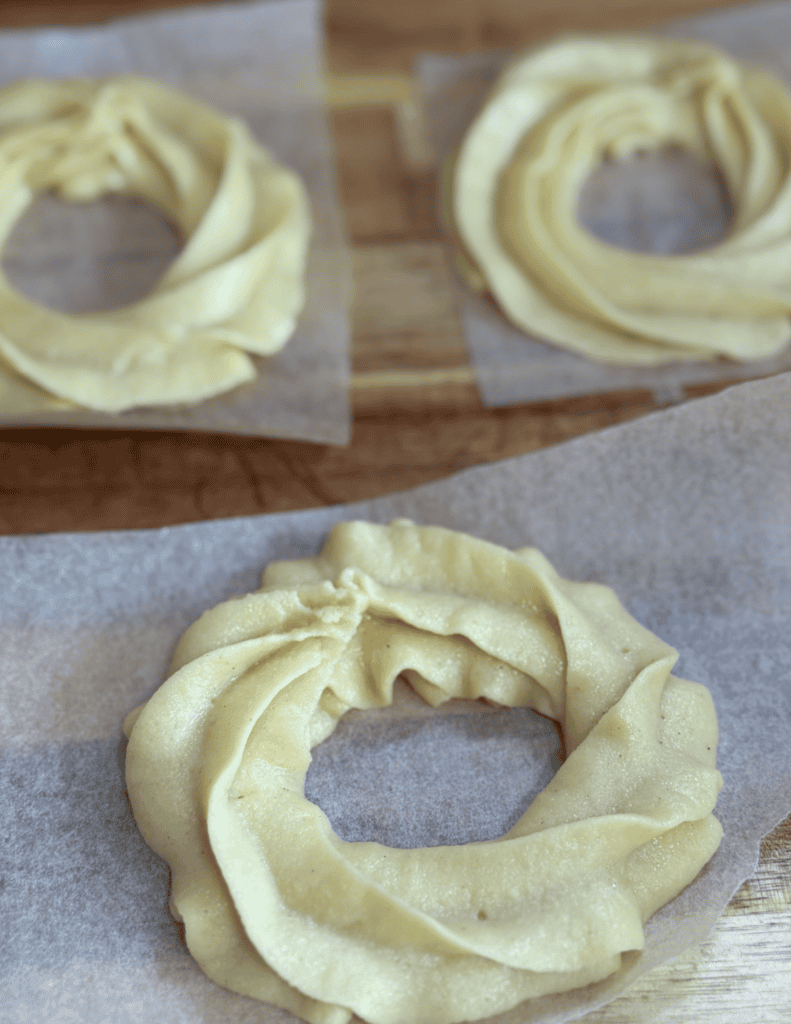 Gluten free French crullers with a bakery-style appearance, perfect for a delicious treat.