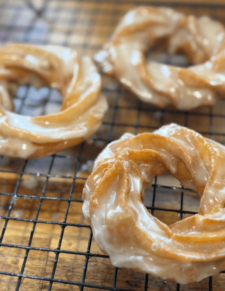 Delicious homemade pretzels with a shiny glaze, perfect for snacking or sharing at Farm Fresh Family.