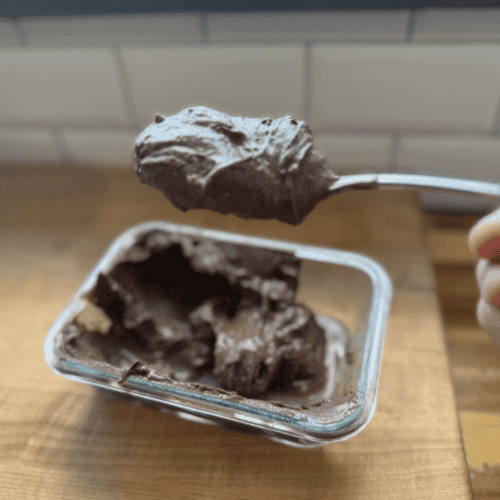 Delicious homemade chocolate spread on a spoon, ready to enjoy.