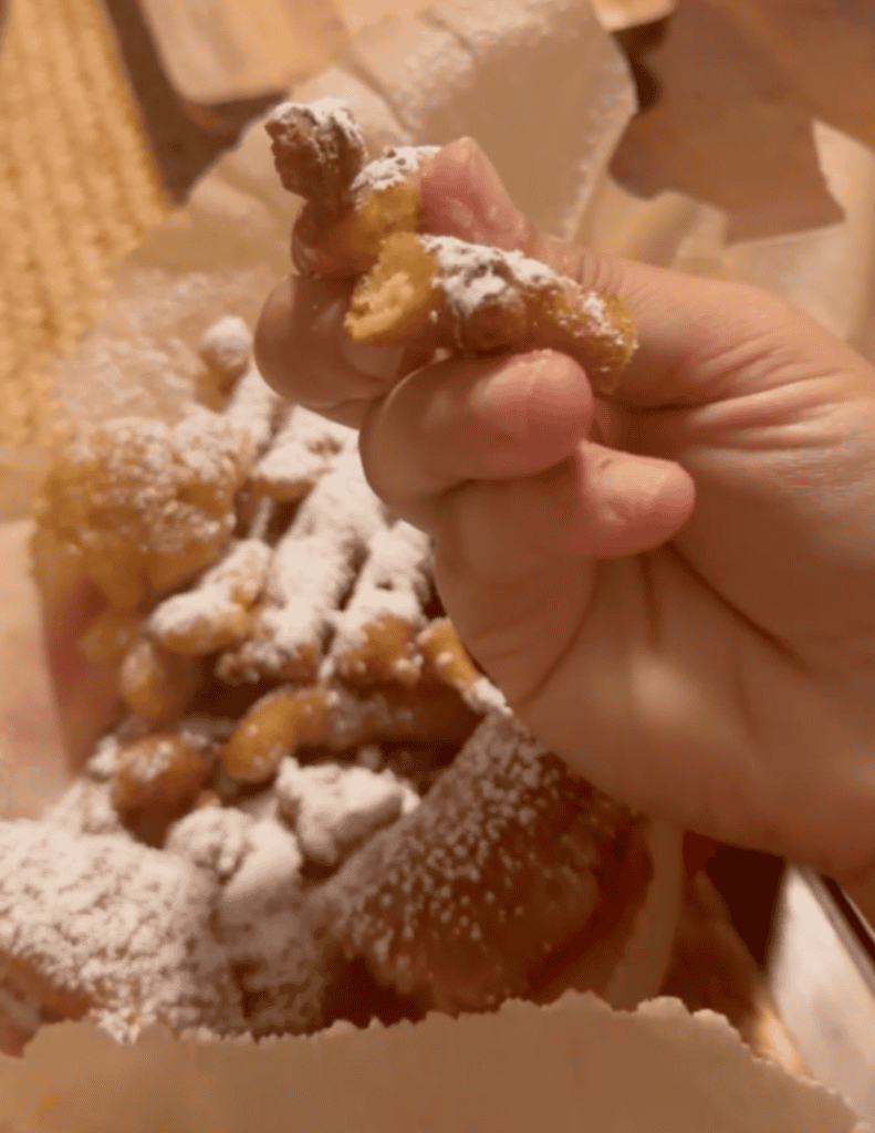 breaking open funnel cake
