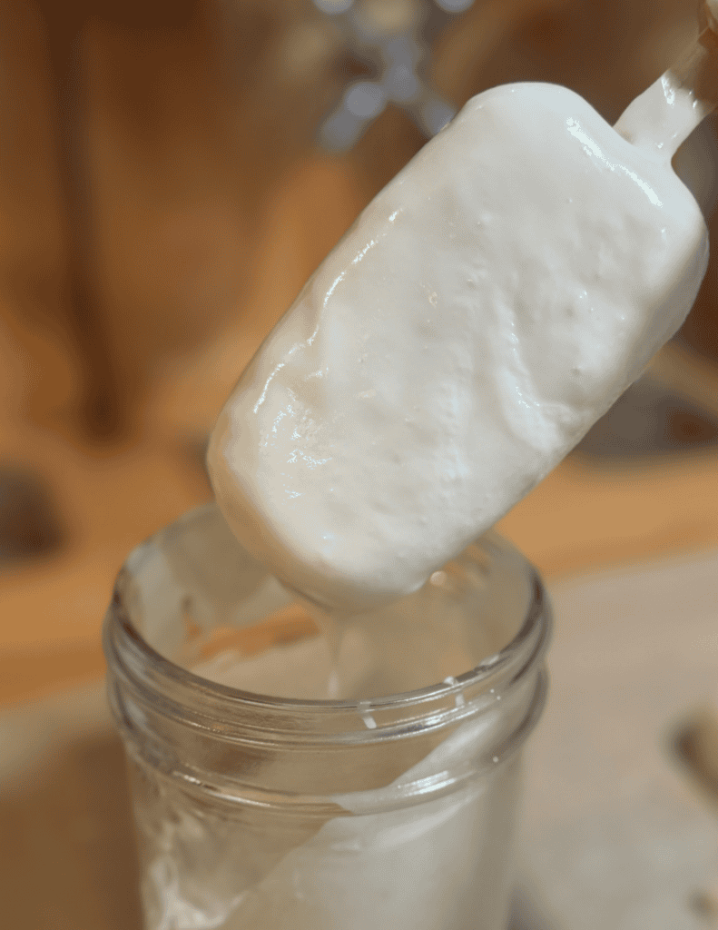 Creamy homemade ice cream on a stick, fresh from the farm.