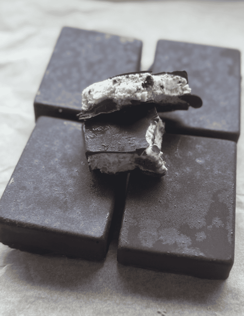 Delicious homemade chocolate cookie bars with creamy filling and chocolate coating.