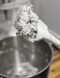 Fresh homemade ice cream scoop with farm-fresh ingredients.