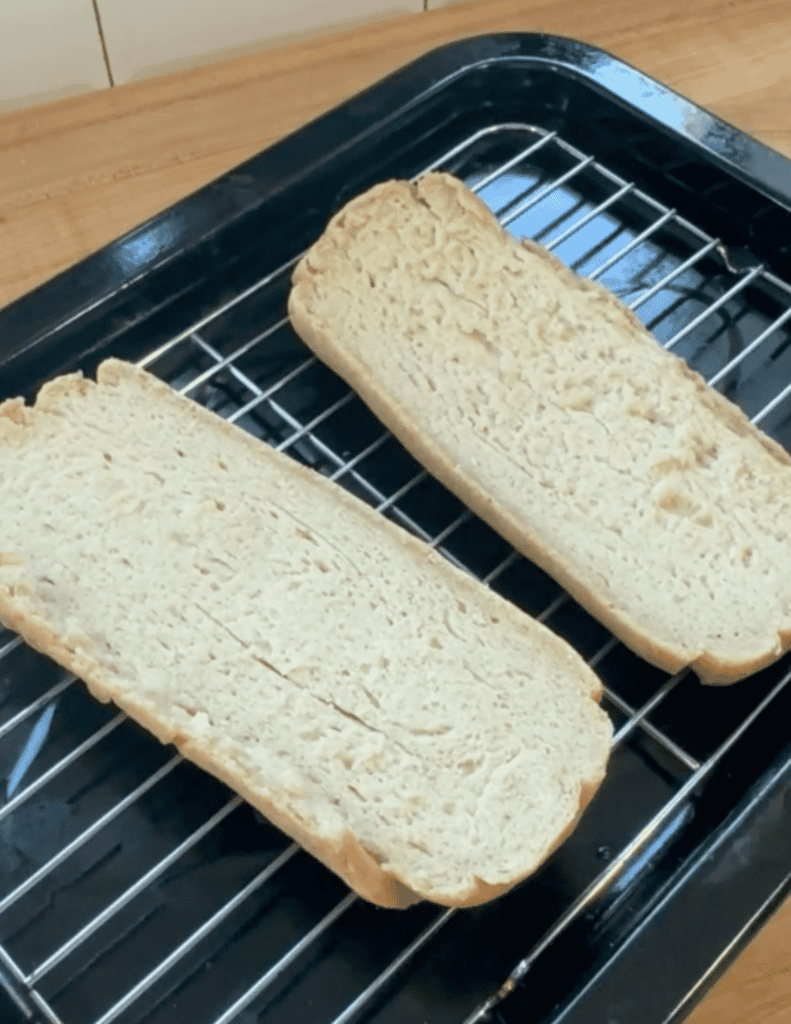 Freshly baked homemade bread on cooling rack at Farm Fresh Family.
