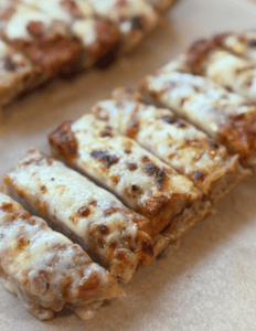 Delicious cheese pizza slice with melted cheese and crispy crust.