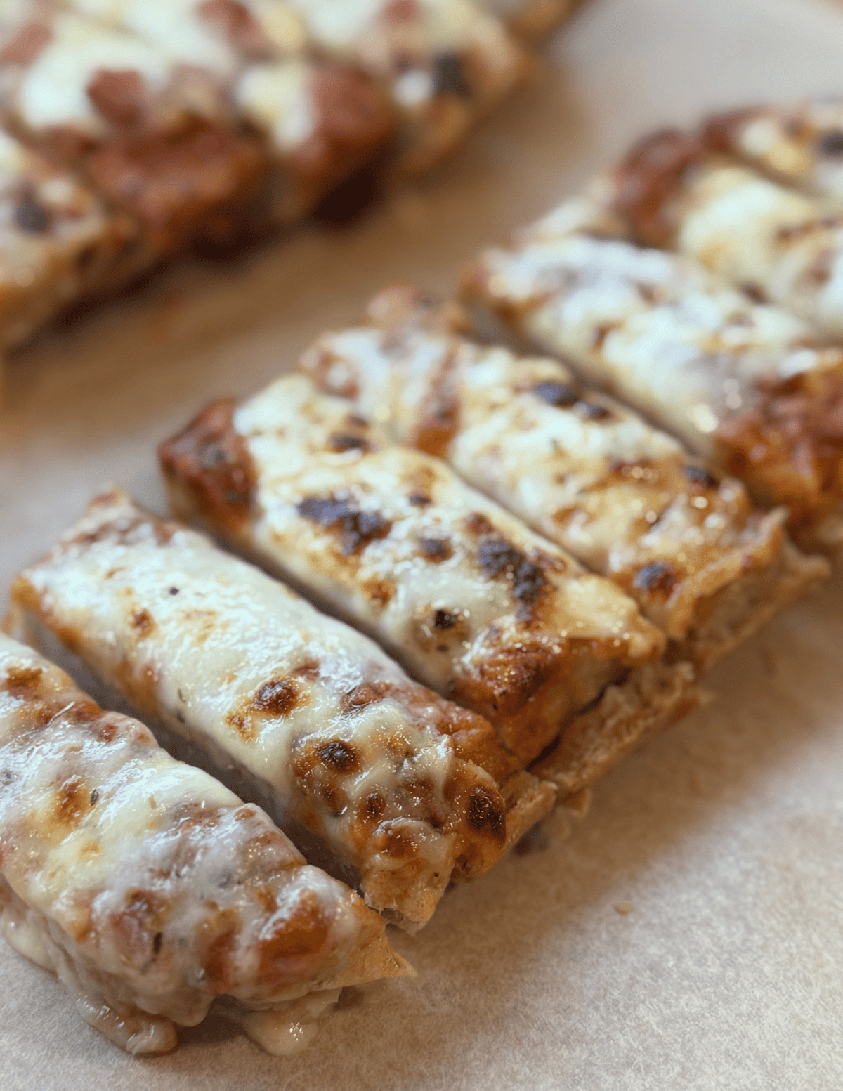 Delicious cheese pizza slice with melted cheese and crispy crust.