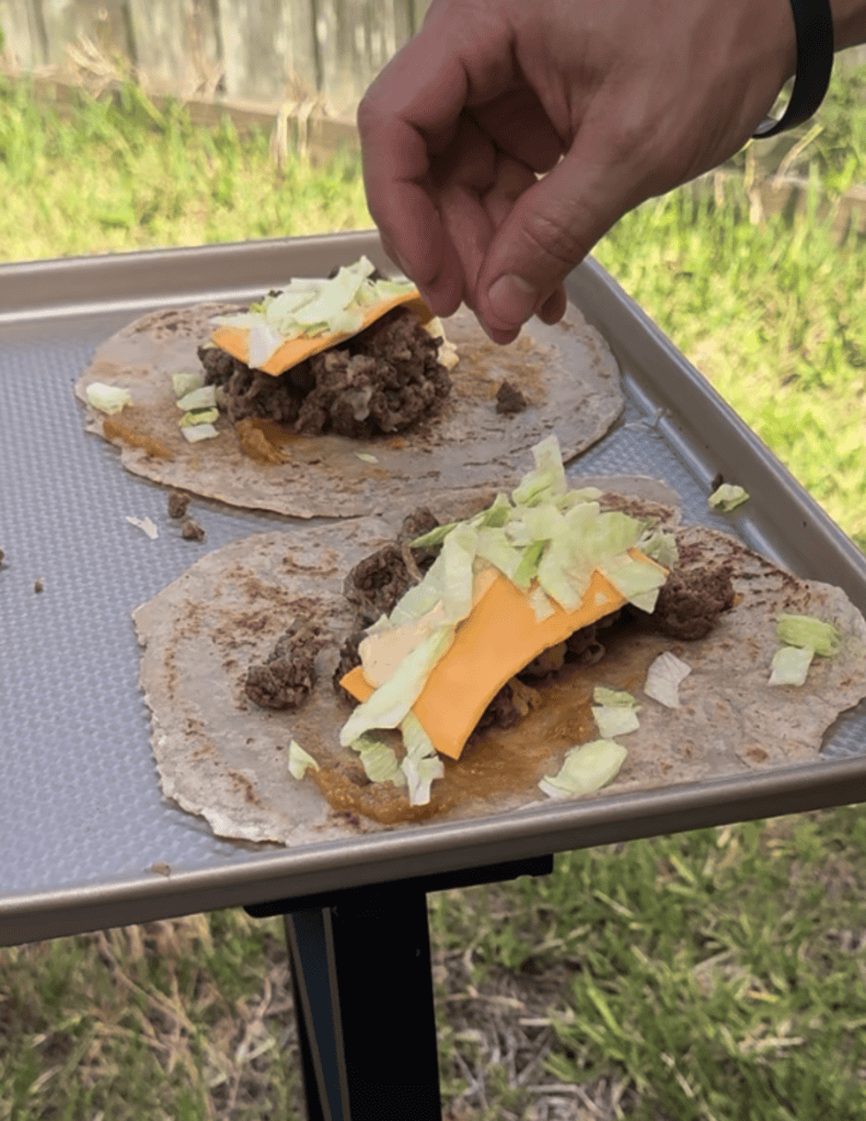 loading a smash burger taco
