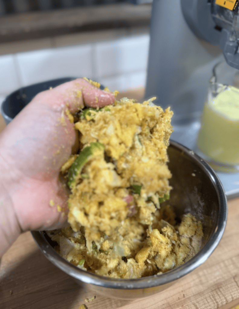 Homemade cornbread stuffing with herbs and vegetables, perfect for holiday dinners and family gather.