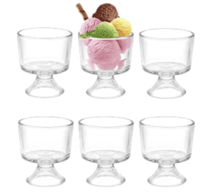 Empty glass bowls for serving ice cream or desserts on a white background.